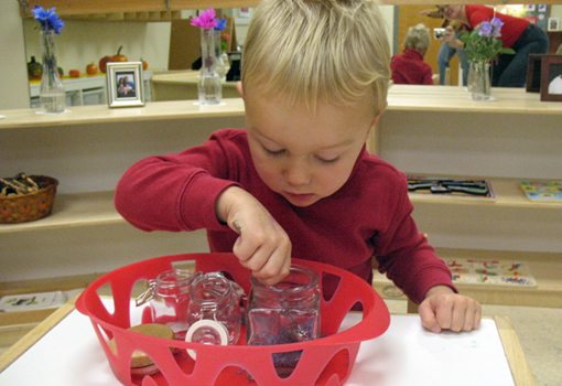 Infant & Toddler_Room Student at work in the Toddler Room