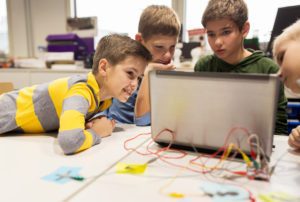 children independently choosing activities in a Montessori classroom