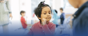 a child studying plant biology with Montessori botany materials